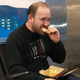 Image for article titled Man Silently Eating Personal Pan Pizza Alone In Corner Of Airport Unaware This Will Be Best Part Of 7-Day Vacation